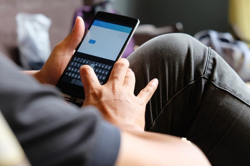 Adult Using Smart Phone In Indoor Setting 2026 03 20 05 56 21 Utc