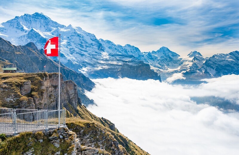Red Swiss Flag At Mannilichen Top Station